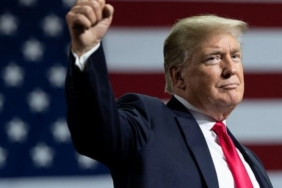 donald-trump-fist-raised-florida-rally-7-31-18-getty-640x480-1-600x360