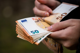 closeup-female-hands-counting-euro-banknotes-world-money-inflation-economy-concept-1-2048x1365